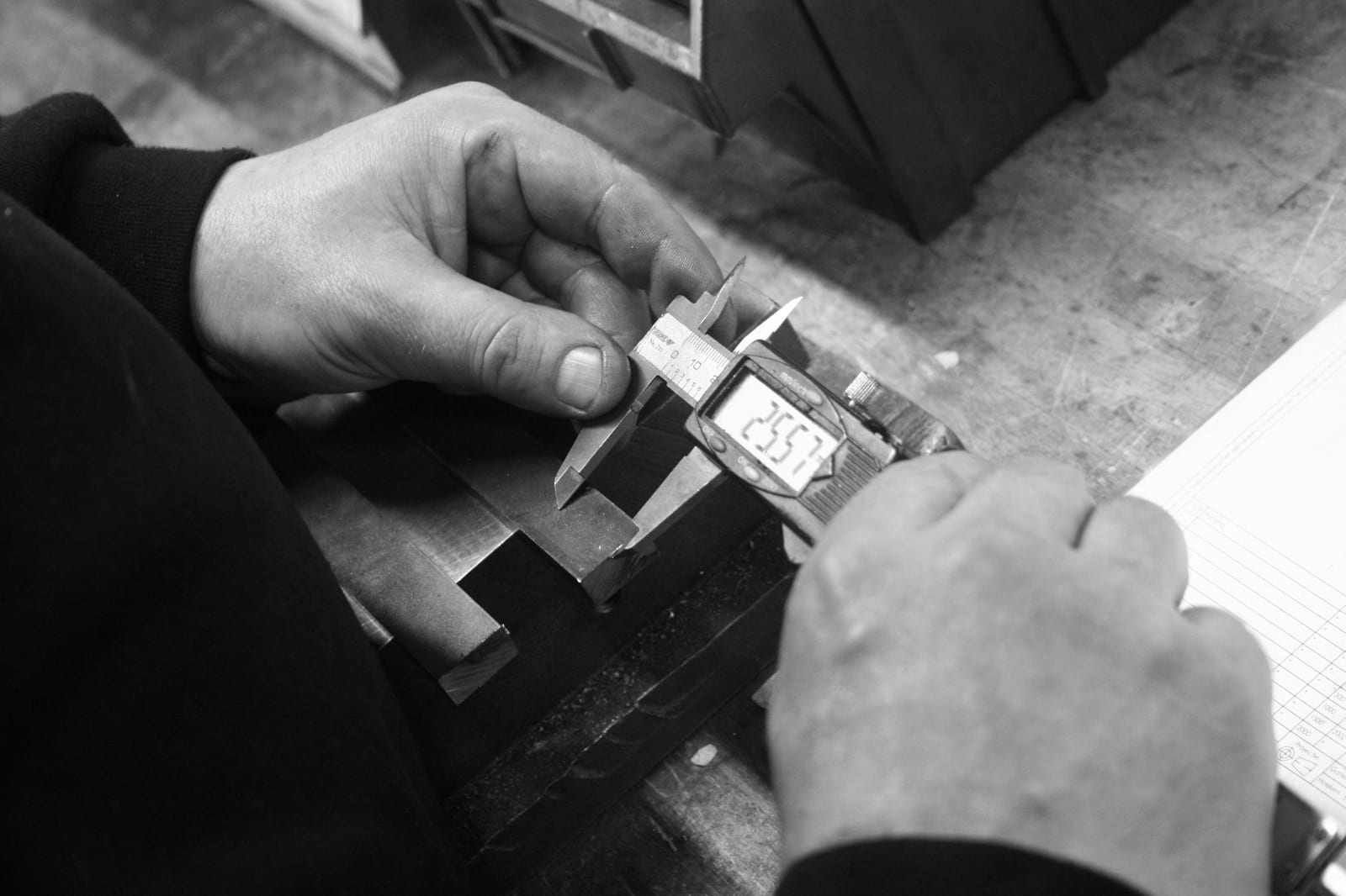 A part being measured with a digital caliper